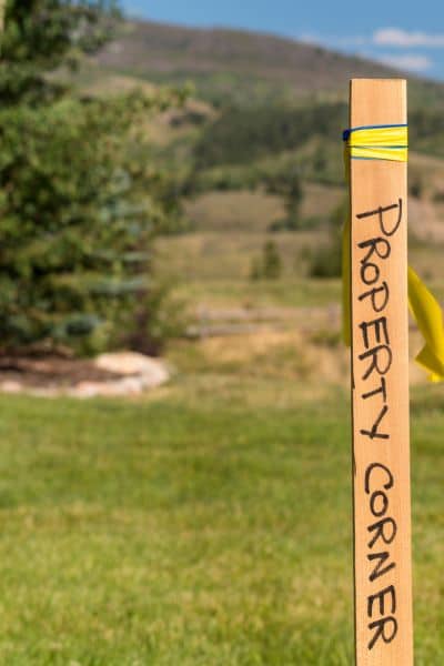 Property corner marker used to find property lines before building a fence or shed
